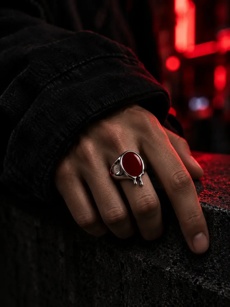 Afterglow Signet worn on the index finger