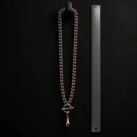 Pour Curb Chain, side view with a ruler for scale