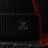 Slag Beanie, close-up af glyffen og stoffet